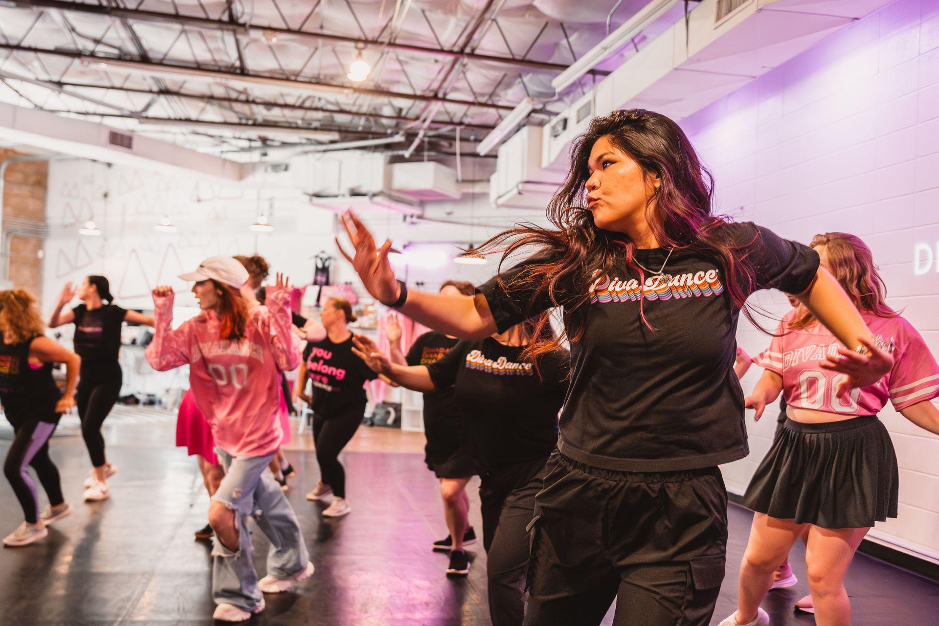DivaDance group class, dancers mid-move