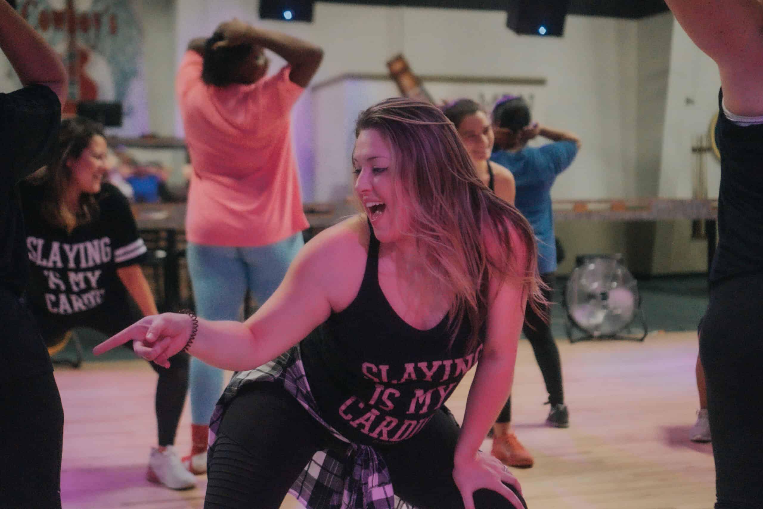 Women dancing at a DivaDance class—moving in sync and having fun.