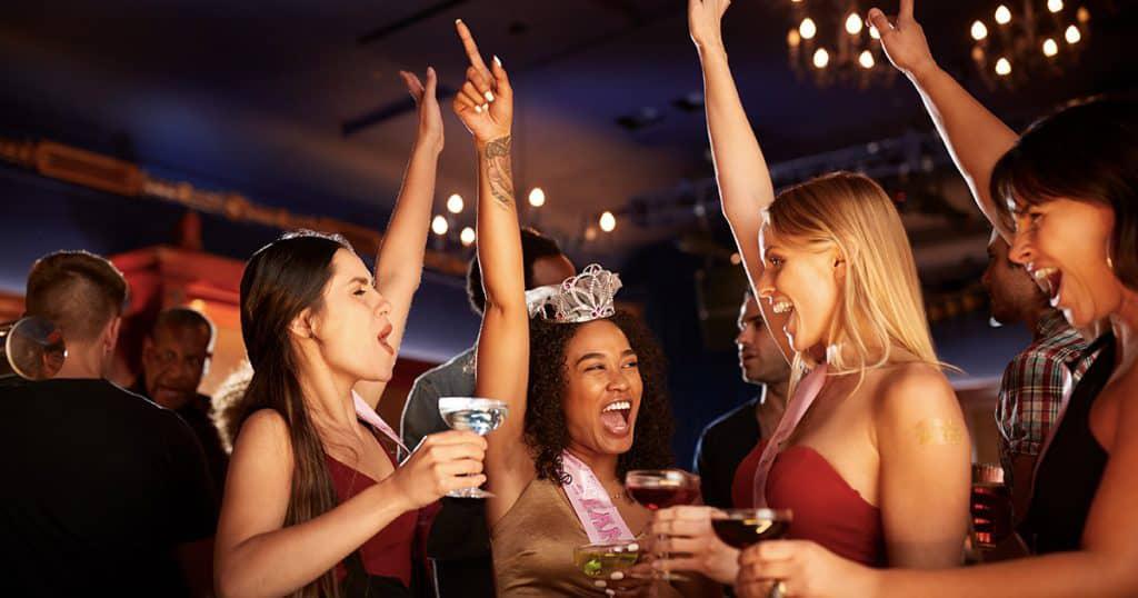 Four Women Dancing at a Club