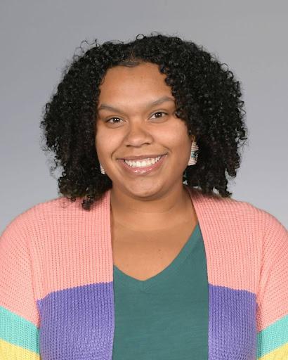 Woman smiling in sweater