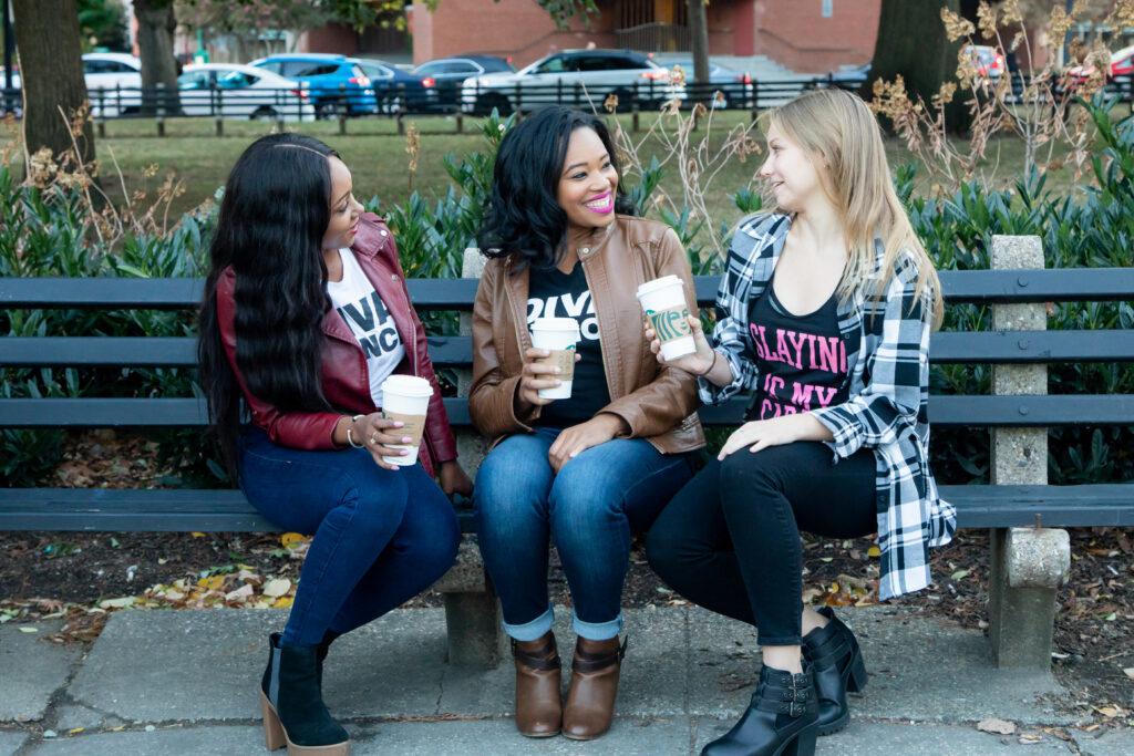 Three women having coffee outside